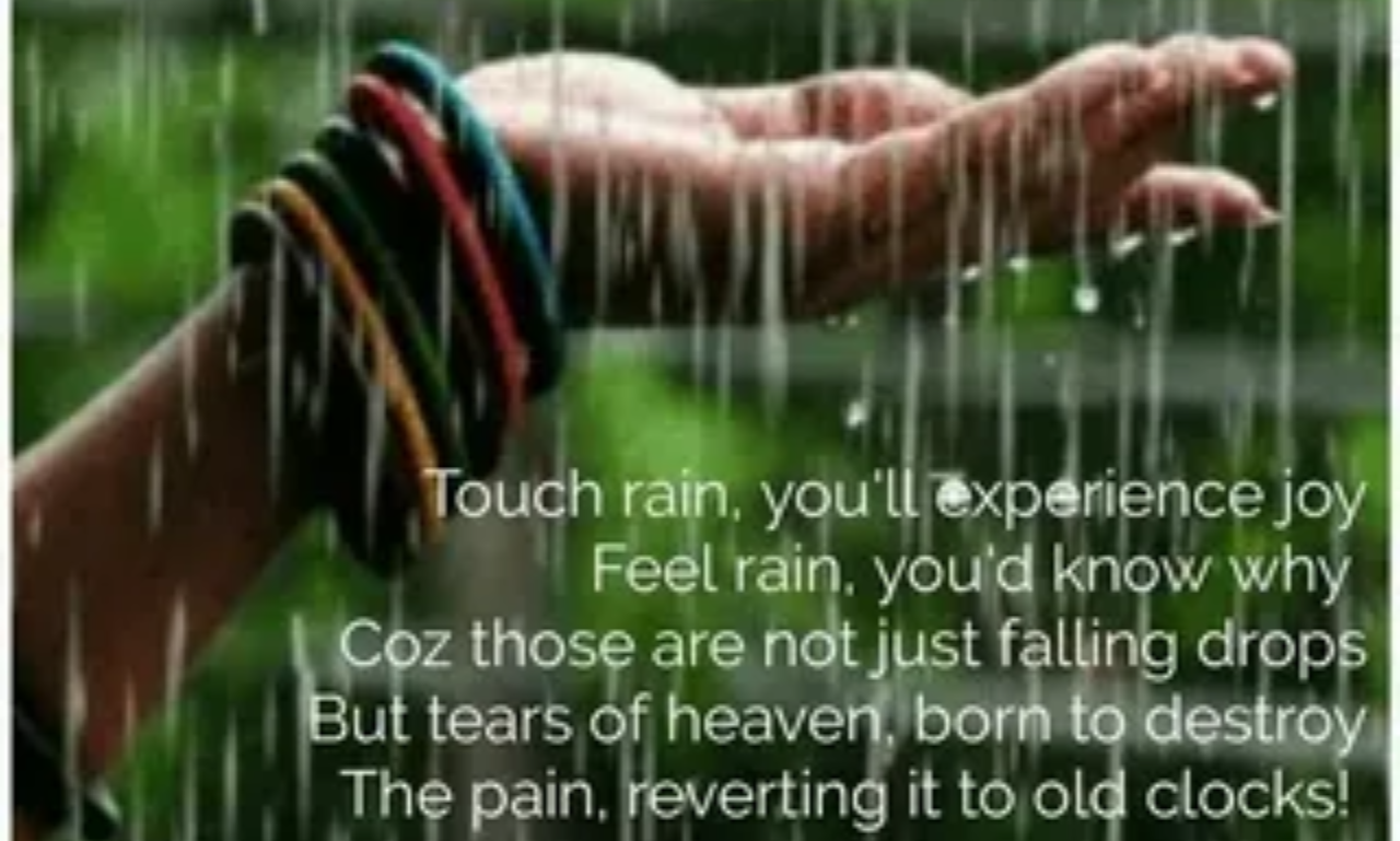 Meaningful rain quotes alongside a scenic path surrounded by gentle rain.